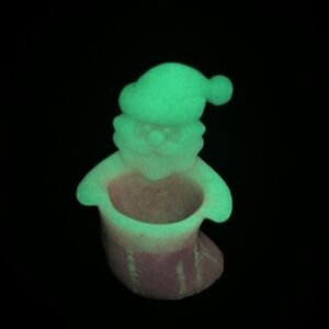 Adorable luminous resin Santa with an open stocking